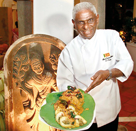 Chef-pubilis-presenting-a-dish 282