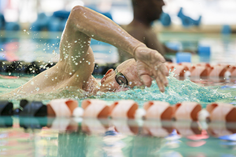 older man swimming healthyaging.net