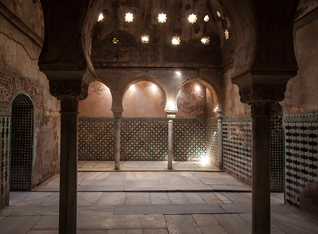 Interior of historic Arab bath (hammam) in the Alhambra palace in Granada, Spain.